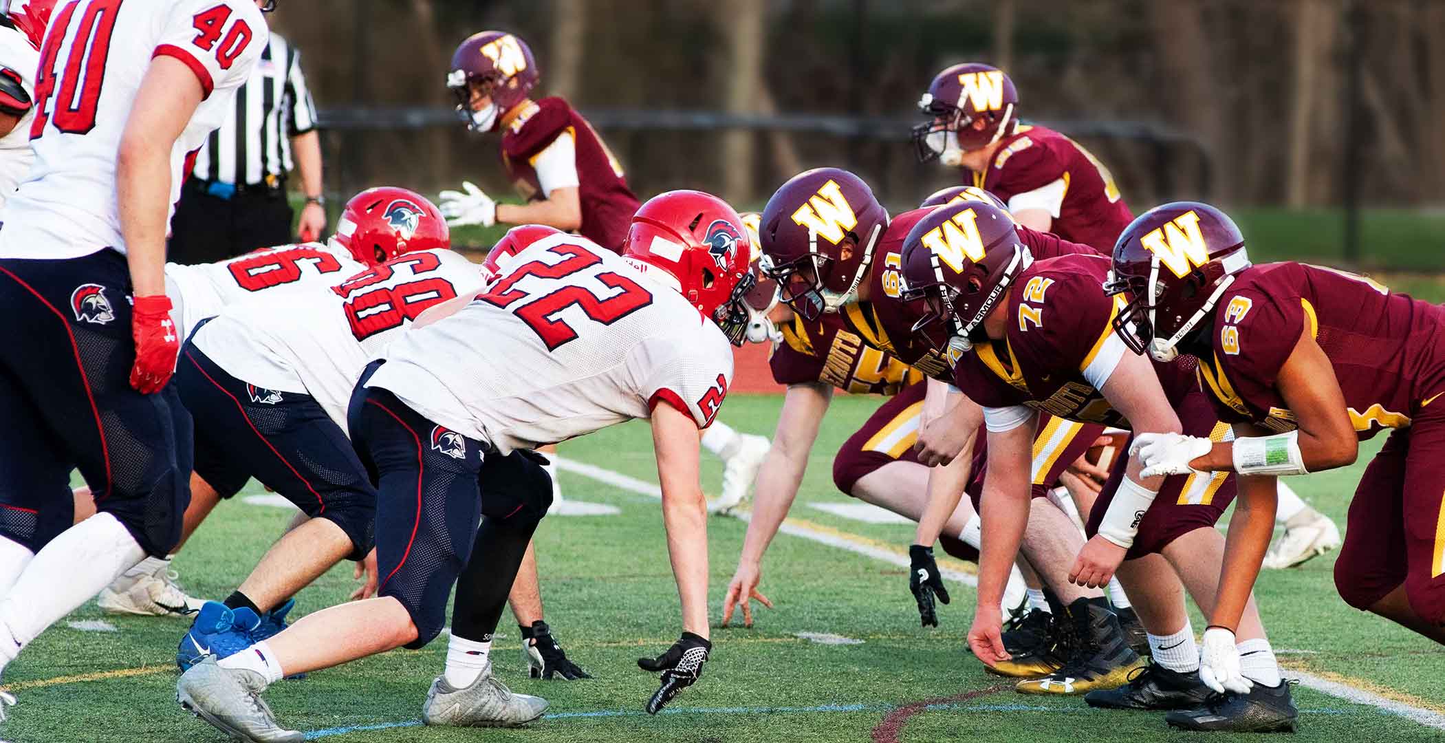 Picture of wildcat players on the line